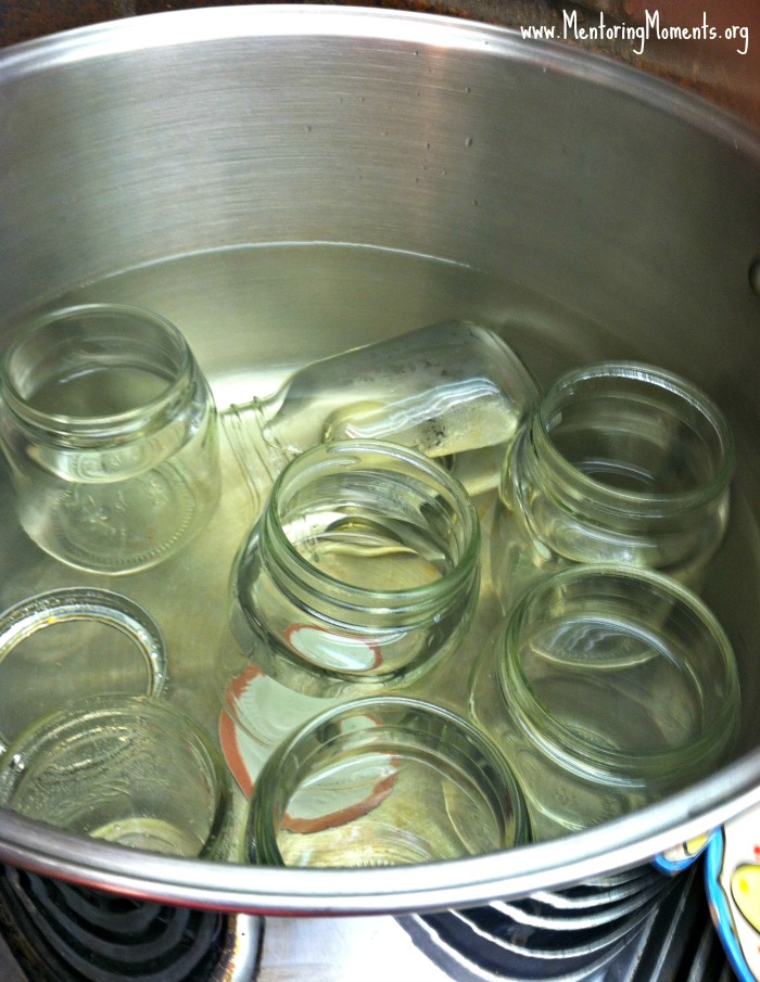 Canning jars being prepped for sweet pickles.