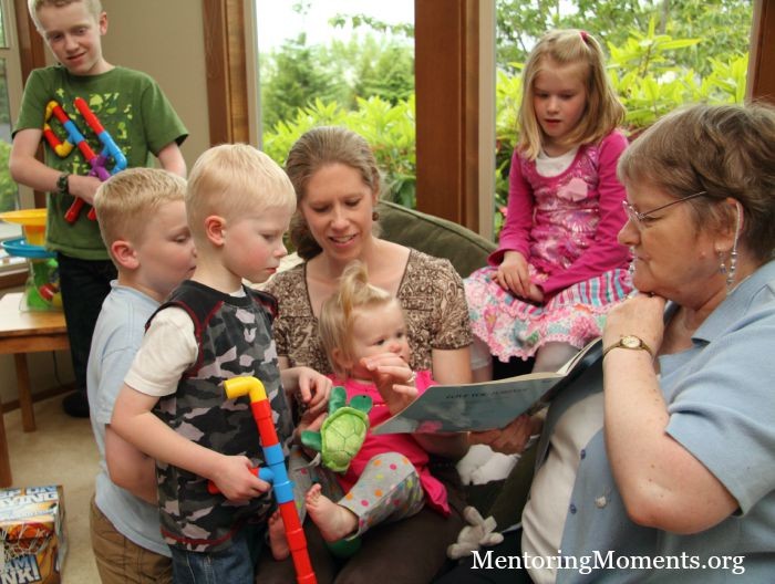 Lydia reading to grandchildren